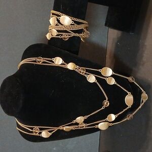 Kennith cole gold tone multi strand necklace and matching bracelet set